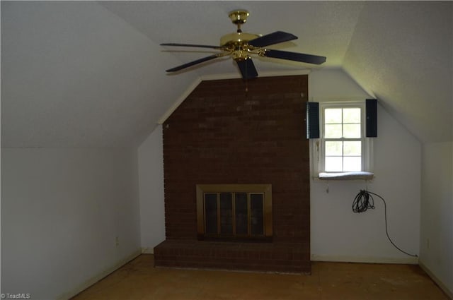 117 Ridgecrest Dr, Mount Airy, NC 27030 - additional living space featuring baseboards, a ceiling fan, a brick fireplace, and lofted ceiling