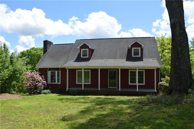 117 Ridgecrest Dr, Mount Airy, NC 27030 - view of front of property with a porch, a front lawn, and a chimney