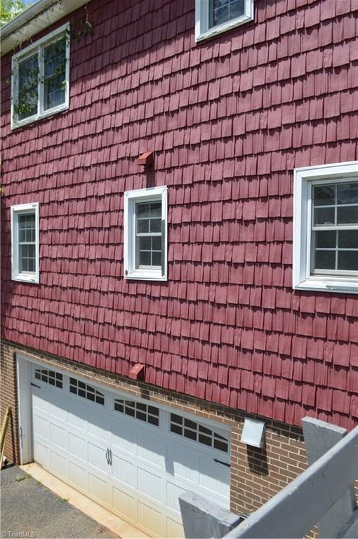 117 Ridgecrest Dr, Mount Airy, NC 27030 - view of home's exterior with brick siding and an attached garage