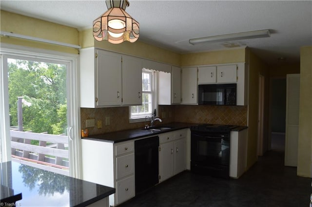 117 Ridgecrest Dr, Mount Airy, NC 27030 - kitchen with a sink, white cabinetry, black appliances, and dark countertops