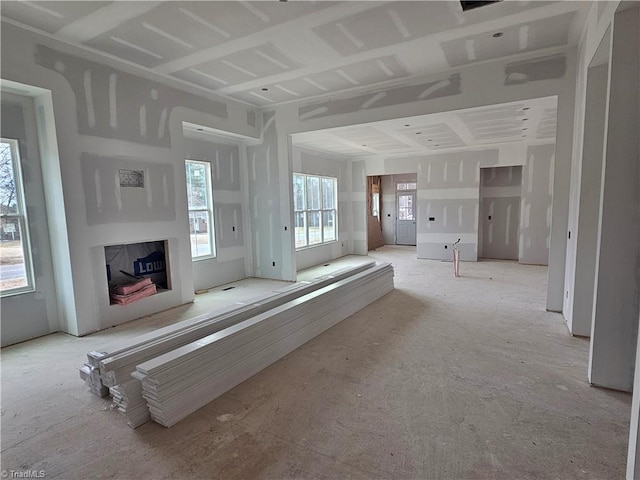 unfurnished living room with a high end fireplace