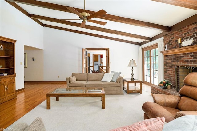 102 Shawnee Cir, Lexington, NC 27295 - living area with a ceiling fan, a fireplace, baseboards, and wood finished floors