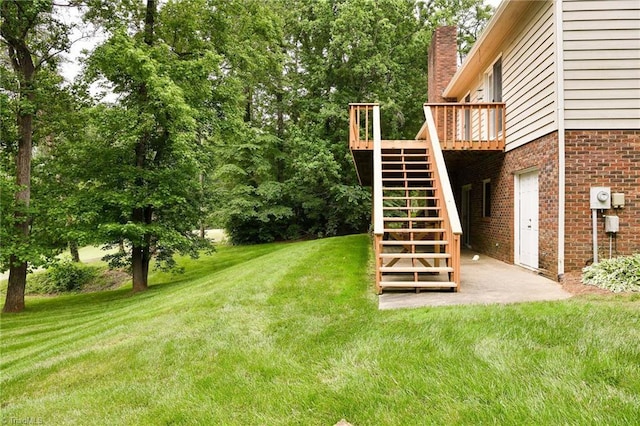 102 Shawnee Cir, Lexington, NC 27295 - view of grassy yard with stairs and a wooden deck