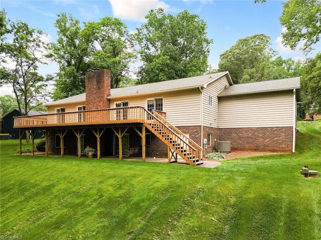 102 Shawnee Cir, Lexington, NC 27295 - back of property with a deck, central AC, a yard, stairway, and a chimney