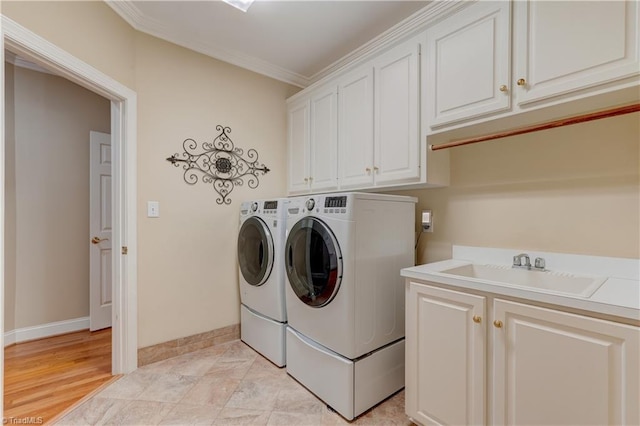 4208 Bitternut Trl, Greensboro, NC 27410 - laundry room with cabinet space, washer and dryer, ornamental molding, and baseboards