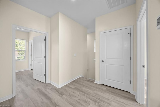 907 Caldwell St, Greensboro, NC 27406 - corridor featuring light wood finished floors and baseboards