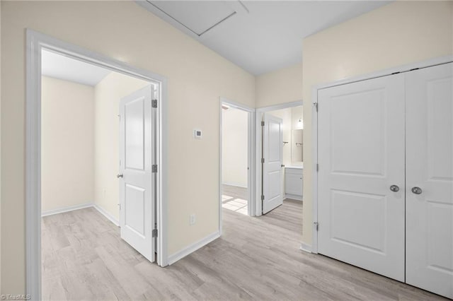 907 Caldwell St, Greensboro, NC 27406 - hallway featuring light wood-style floors and baseboards