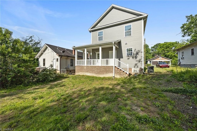 907 Caldwell St, Greensboro, NC 27406 - back of property with covered porch and a lawn