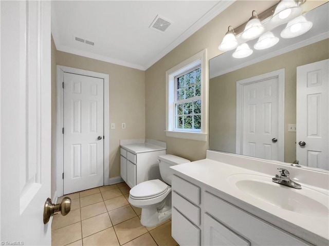 bathroom featuring tile patterned floors, toilet, vanity, and ornamental molding