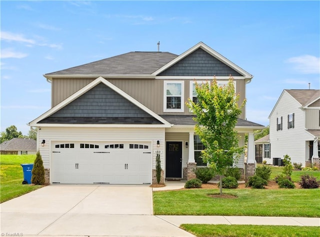 1827 Deveron Ct, Kernersville, NC 27284 - craftsman house featuring a front yard, concrete driveway, and a garage