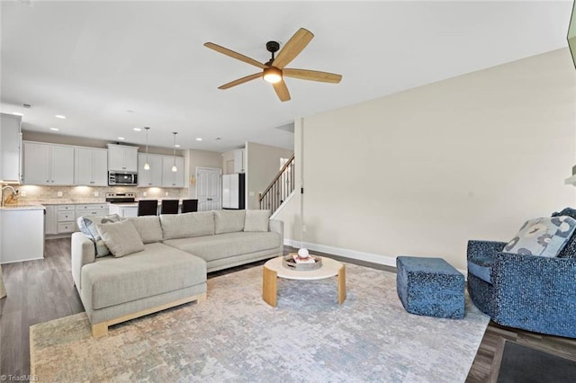 1827 Deveron Ct, Kernersville, NC 27284 - living area with wood finished floors, a ceiling fan, stairs, and recessed lighting