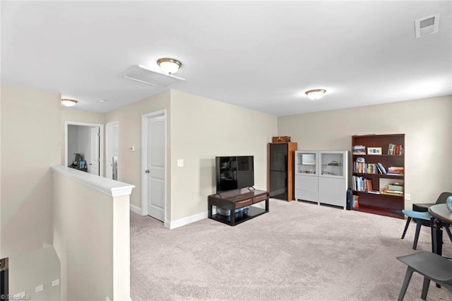 1827 Deveron Ct, Kernersville, NC 27284 - sitting room with carpet, an upstairs landing, and attic access
