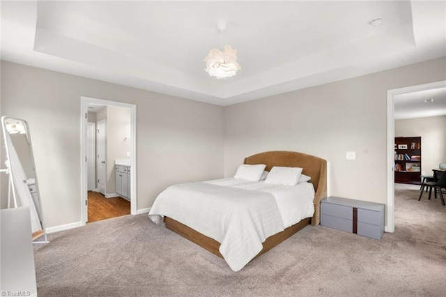 1827 Deveron Ct, Kernersville, NC 27284 - bedroom with carpet floors, a tray ceiling, and ensuite bath