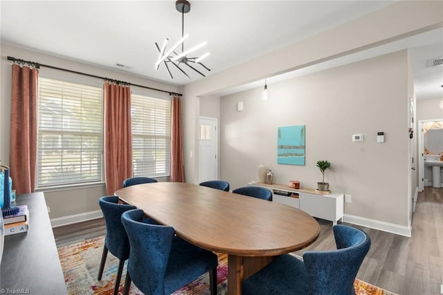 1827 Deveron Ct, Kernersville, NC 27284 - dining room featuring a chandelier and light wood-type flooring