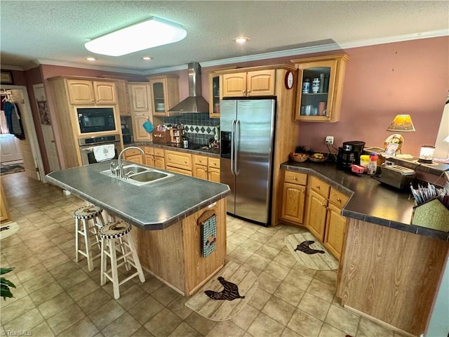 7658 Salem Chapel Rd, Walnut Cove, NC 27052 - kitchen with appliances with stainless steel finishes, wall chimney range hood, dark countertops, a breakfast bar, and ornamental molding
