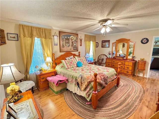 7658 Salem Chapel Rd, Walnut Cove, NC 27052 - bedroom with light wood-style floors, a textured ceiling, crown molding, and ceiling fan