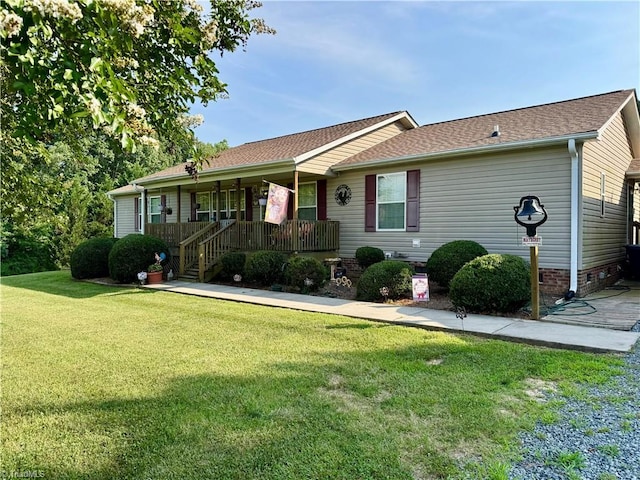 7658 Salem Chapel Rd, Walnut Cove, NC 27052 - ranch-style home featuring covered porch, a front yard, and a shingled roof