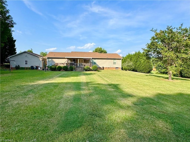 7658 Salem Chapel Rd, Walnut Cove, NC 27052 - rear view of house featuring covered porch and a yard