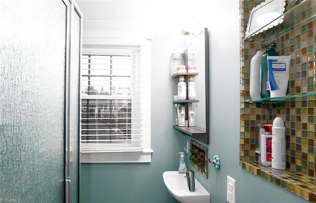 bathroom featuring tasteful backsplash