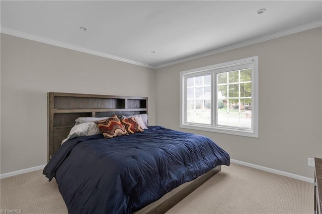 bedroom with light carpet and crown molding