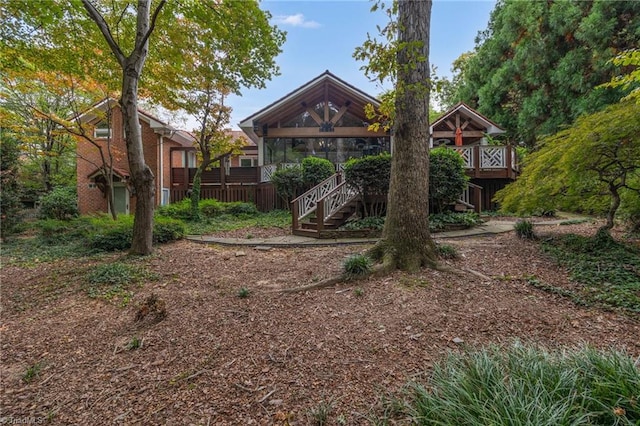 view of yard with a wooden deck