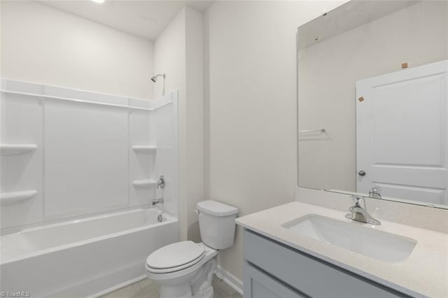 full bathroom with vanity, toilet, and  shower combination