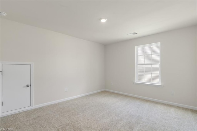 empty room featuring carpet flooring