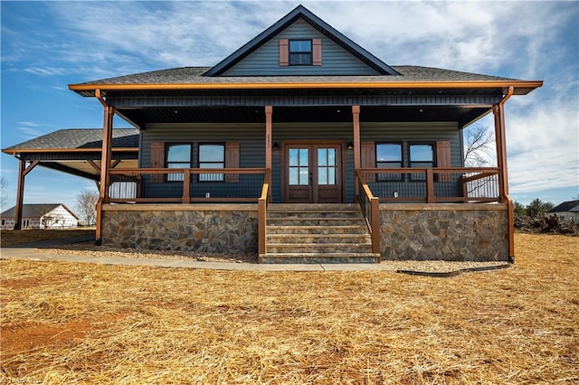 view of front of home with roof with shingles