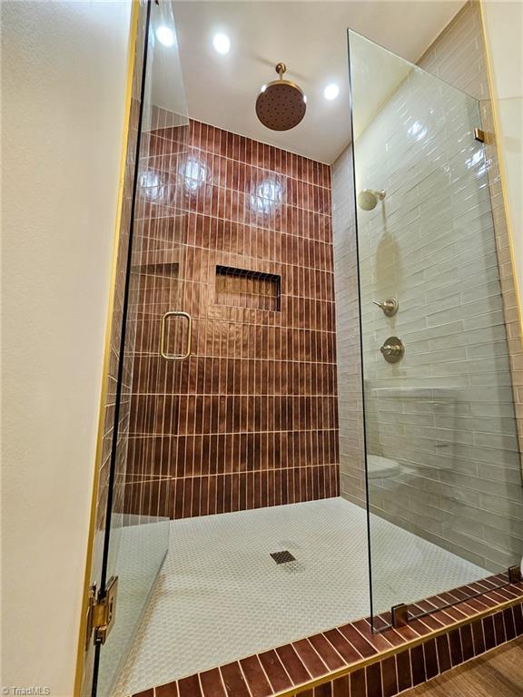 full bath featuring a stall shower