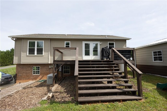 113 Stone Bridge Rd, Mount Airy, NC 27030 - back of property with stairway, a wooden deck, and central air condition unit