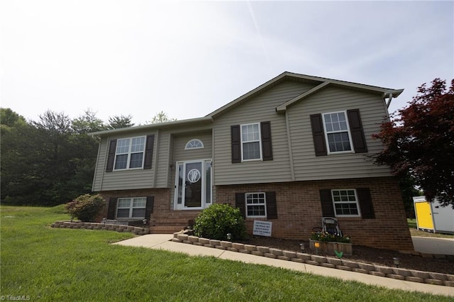 113 Stone Bridge Rd, Mount Airy, NC 27030 - raised ranch with brick siding and a front yard