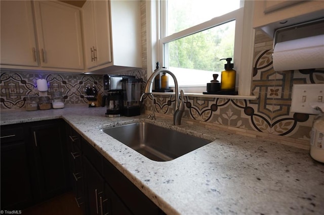 113 Stone Bridge Rd, Mount Airy, NC 27030 - kitchen featuring a sink, tasteful backsplash, light stone countertops, and white cabinets