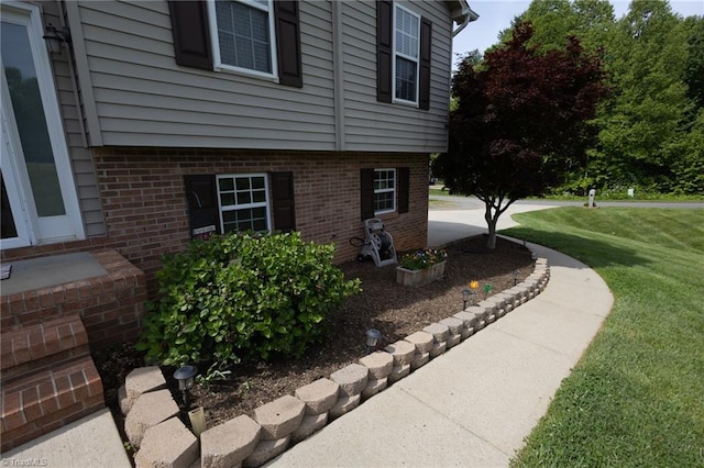 113 Stone Bridge Rd, Mount Airy, NC 27030 - view of home's exterior featuring a yard and brick siding