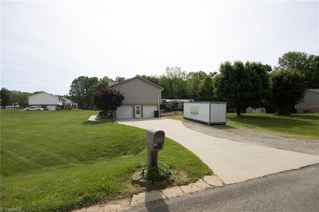 113 Stone Bridge Rd, Mount Airy, NC 27030 - view of front of house featuring a garage, a front yard, and concrete driveway