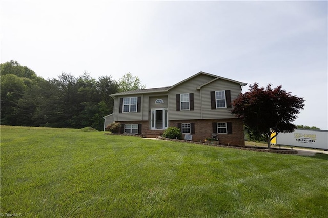 113 Stone Bridge Rd, Mount Airy, NC 27030 - bi-level home featuring a front yard, entry steps, and brick siding