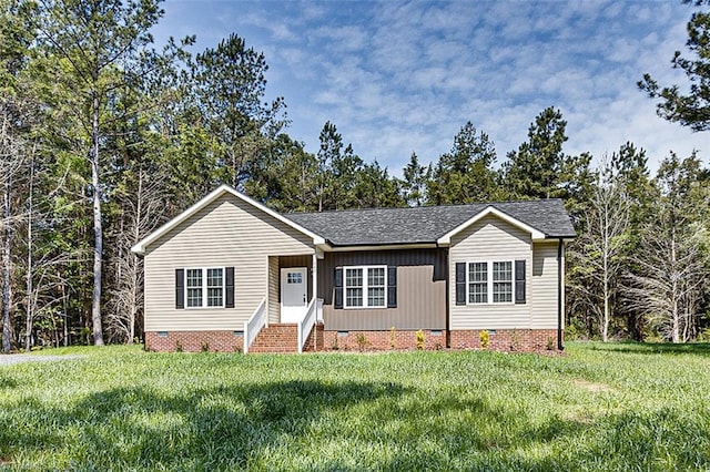 single story home featuring a front yard, crawl space, and a shingled roof