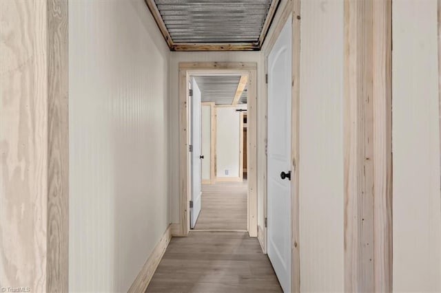 539 W Salisbury St, Denton, NC 27239 - hallway featuring wood finished floors and baseboards