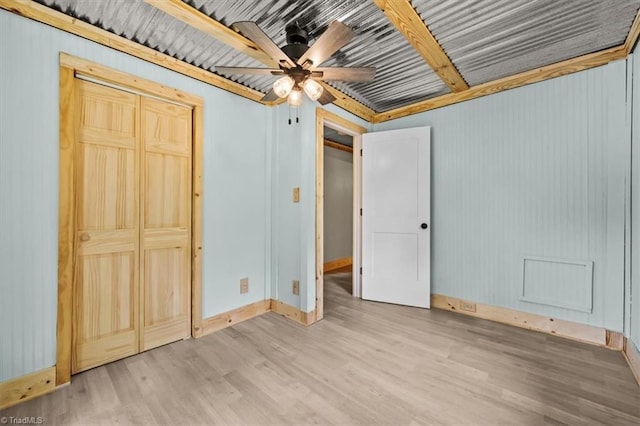 539 W Salisbury St, Denton, NC 27239 - unfurnished bedroom featuring wood finished floors and baseboards