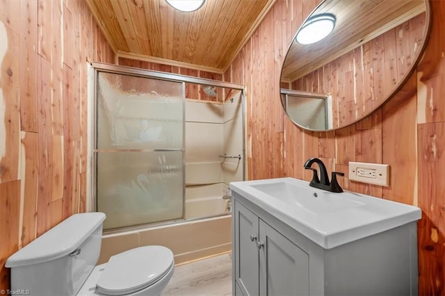539 W Salisbury St, Denton, NC 27239 - full bath with wooden walls, vanity, wooden ceiling, and shower / bath combination with glass door