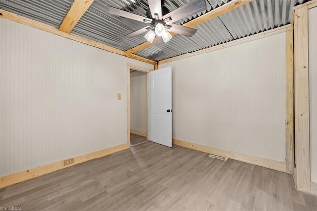 539 W Salisbury St, Denton, NC 27239 - spare room with wood finished floors and ceiling fan