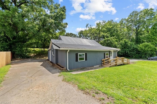 539 W Salisbury St, Denton, NC 27239 - view of front of home with a deck and a metal roof