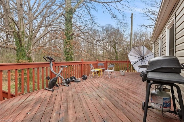 wooden deck featuring grilling area