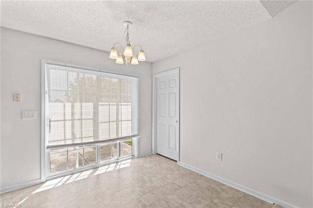 189 Lochshire Ln, Woodleaf, NC 27054 - empty room with a chandelier and a textured ceiling