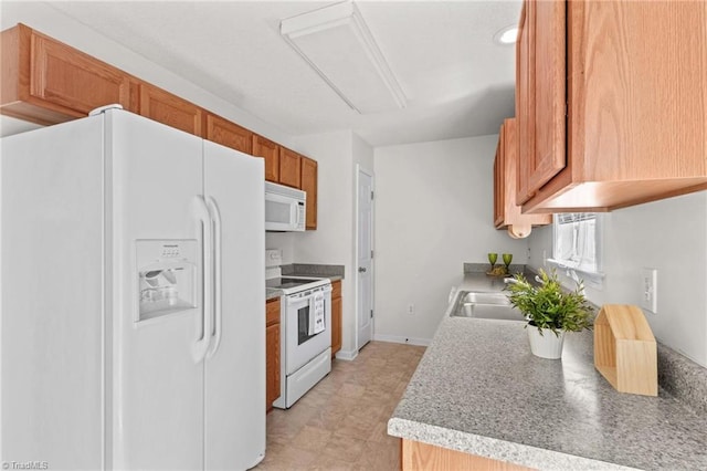 189 Lochshire Ln, Woodleaf, NC 27054 - kitchen featuring white appliances, brown cabinets, and light countertops