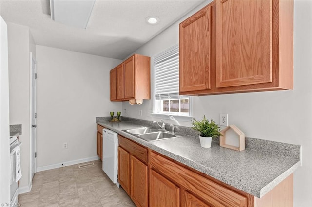 189 Lochshire Ln, Woodleaf, NC 27054 - kitchen with white dishwasher, range, and brown cabinets