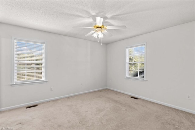189 Lochshire Ln, Woodleaf, NC 27054 - carpeted spare room with a ceiling fan and a textured ceiling