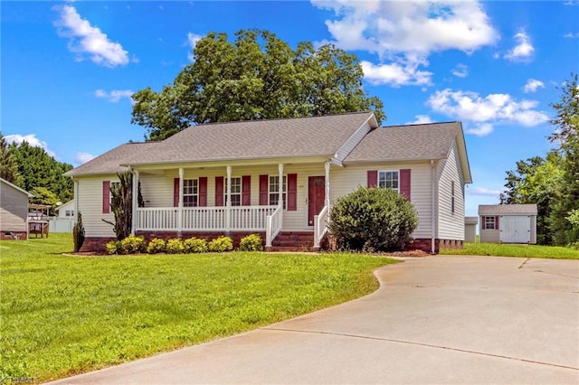 189 Lochshire Ln, Woodleaf, NC 27054 - single story home featuring a porch, a shed, a front lawn, and concrete driveway