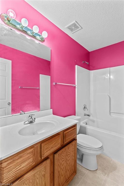 189 Lochshire Ln, Woodleaf, NC 27054 - bathroom with vanity, washtub / shower combination, a textured ceiling, and tile patterned flooring