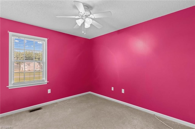 189 Lochshire Ln, Woodleaf, NC 27054 - unfurnished room with a ceiling fan, carpet, and a textured ceiling