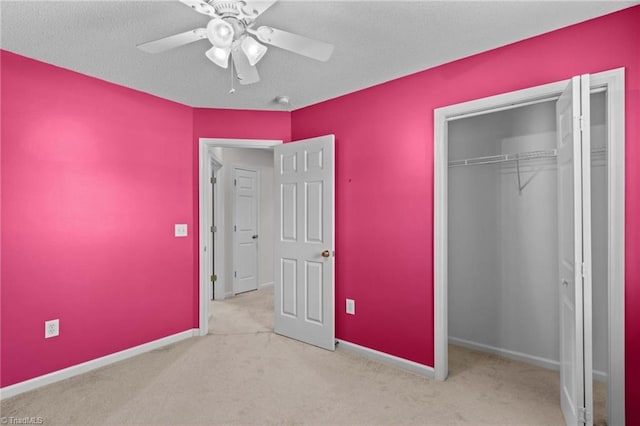 189 Lochshire Ln, Woodleaf, NC 27054 - unfurnished bedroom featuring carpet flooring, a closet, and ceiling fan